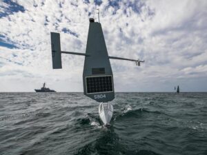 Two Saildrone Explorer unmanned surface vessels and the guided-missile destroyer USS Delbert D. Black (DDG-119) operate in the Persian Gulf on Jan. 8, 2022 as part of the International Maritime Security Construct’s Sentinel Shield exercise. (Photo: U.S. Navy, by Mass Communication Specialist 2nd Class Jeremy R. Boan)