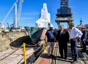 Secretary of the Navy Carlos Del Toro toured the Mare Island Dry Dock on the historic Mare Island Shipyard in Vallejo, Calif. On October 2 with Rep. John Garamendi. The Secretary is looking to increase shipyard capacity in the Pacific Ocean region. (Photo: U.S. Navy).