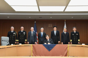 Japanese Prime Minister Fumio Kishida (center) signed a Letter of Offer and Acceptance (LOA) for RTX [RTX] Tomahawk land attack cruise missiles with Defense Minister Minoru Kihara (right of center) and U.S. Ambassador to Japan Rahm Emanuel (left of center) present on January 18 at the Ministry of Defense. (Photo: Japan Ministry of Defense)