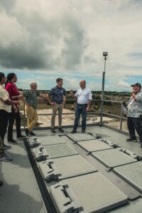 Acting Under Secretary of the Navy Tom Mancinelli receives a briefing during his tour of the Vertical Launch System (VLS) site on Oct. 17, 2024. The visit provided insights into the site's role in protecting Guam and the Indo-Pacific region from ballistic missile threats, underscoring the importance of the MK-41 system in regional defense operations. (Photo: U.S. Navy by William J. Busby III)